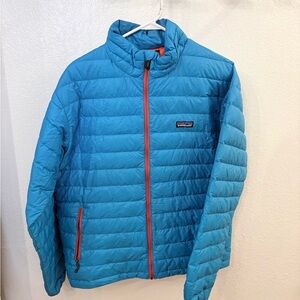 Patagonia Men’s Turquoise Puffer Jacket with Orange Zipper